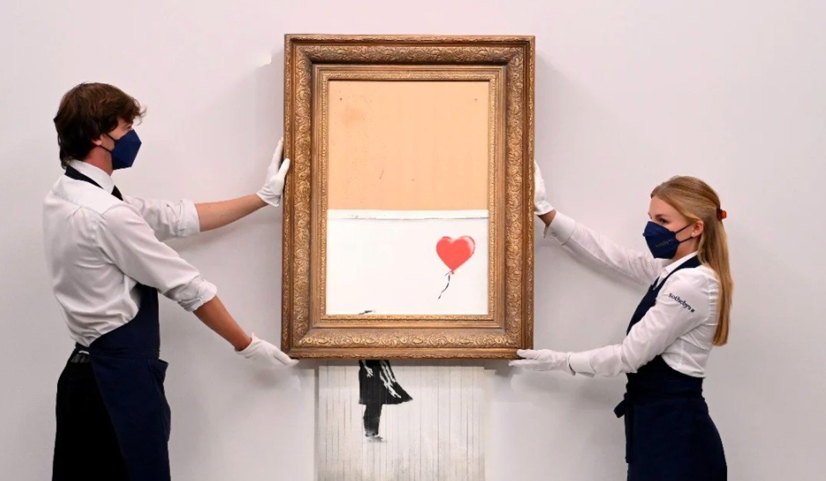 Obra autodestruida de Banksy es subastada en 25.4 mdd